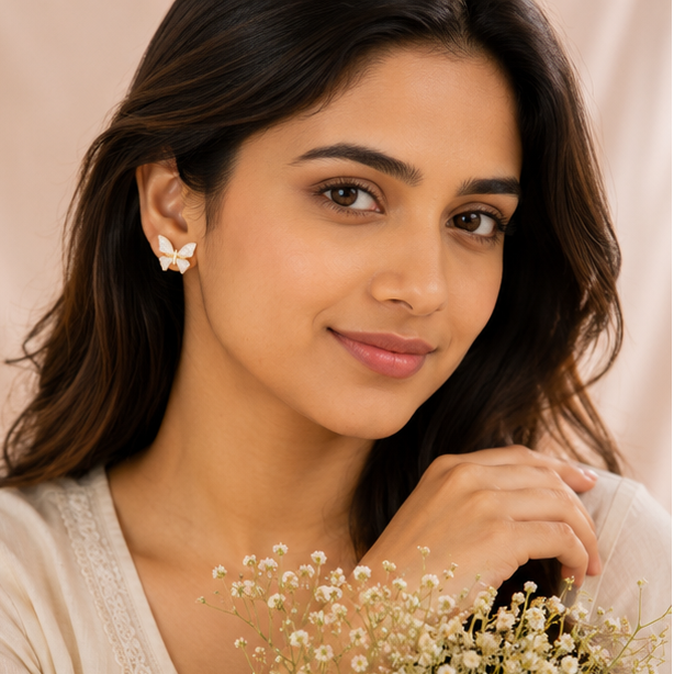 White butterfly stud earrings styled for daily wear JeevaFashions