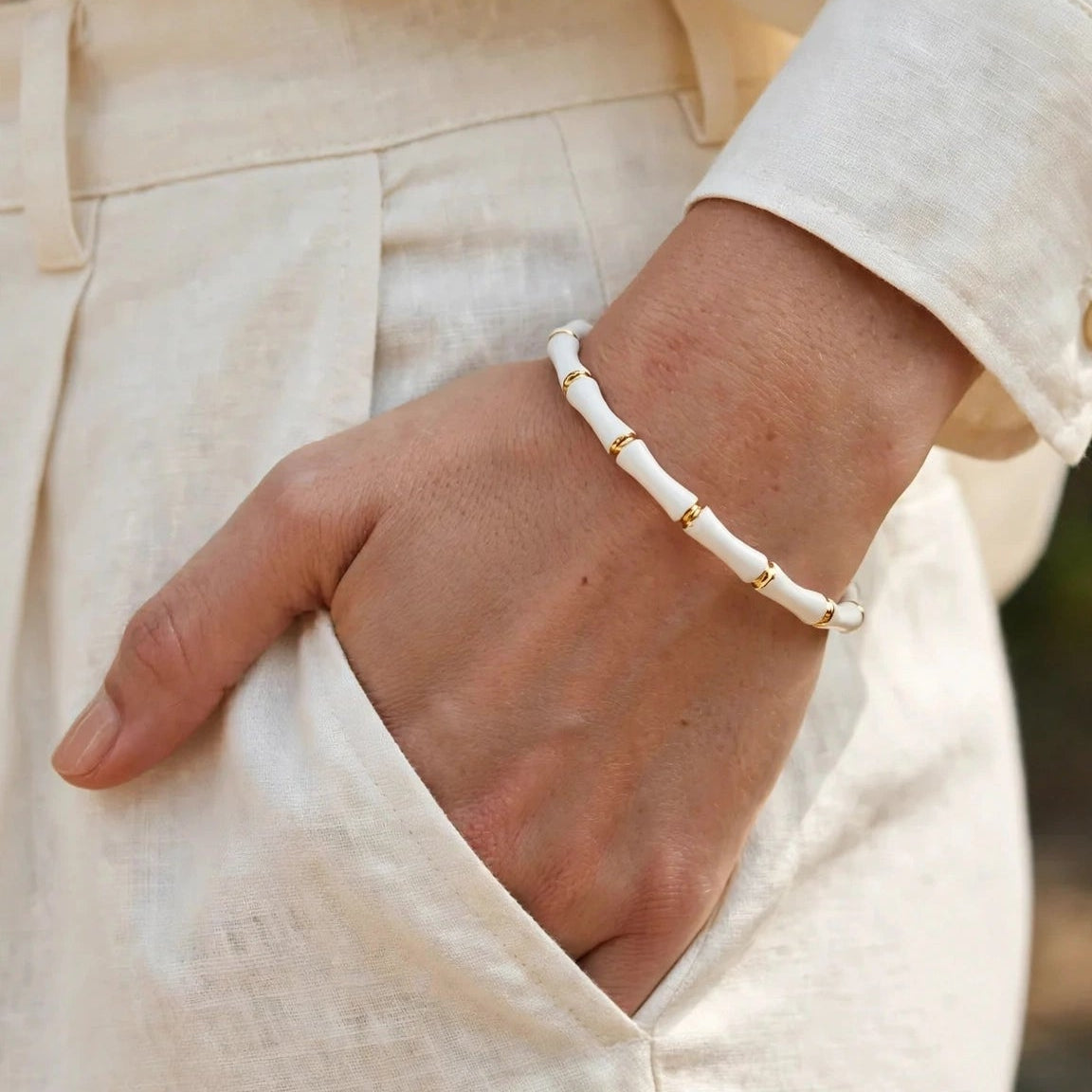 Spring-hinge clasp on white enamel bamboo bracelet for women at JeevaFashions