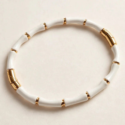 White enamel bamboo bracelet with gold hardware for women at JeevaFashions