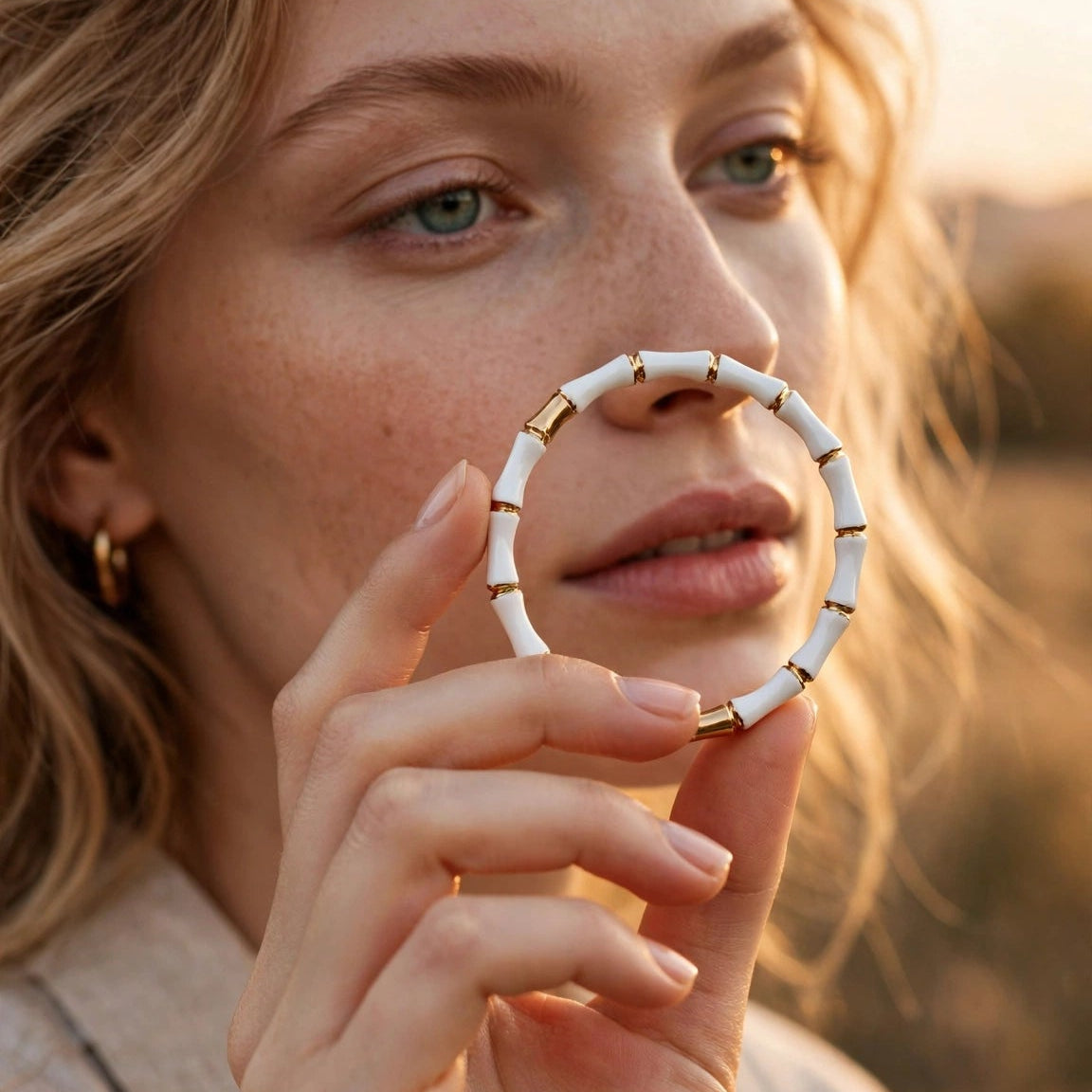 White enamel bamboo bracelet stacked with gold accents for women at JeevaFashions