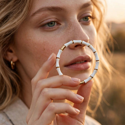 White enamel bamboo bracelet stacked with gold accents for women at JeevaFashions