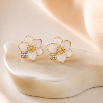 White flower gold tone earrings styled for women JeevaFashions