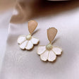 White flower pearl stud earrings gold tone for women JeevaFashions